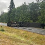 Truck carrying 10,000 Bottles Of Booze Tips Over On Highway Without A Single Breakage