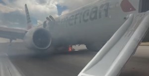 American Airlines Plane Evacuated After Fiery Landing Gear Incident