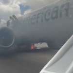American Airlines Plane Evacuated After Fiery Landing Gear Incident